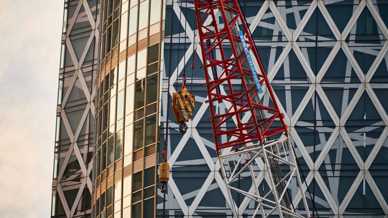 High rise office buildings with crane in foreground